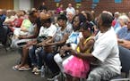 The Castile family sat in the front row of a listening session hosted by the Falcon Heights City Council for residents devoted specificially to the de