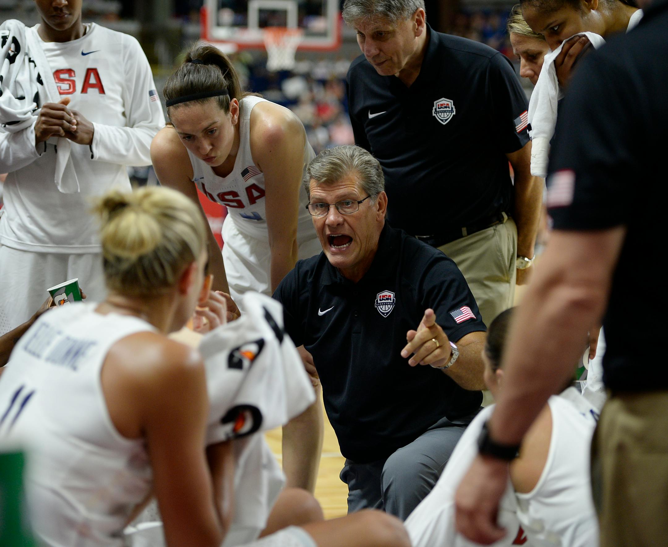 United States coach Geno Auriemma talks to his team during the first half of an exhibition basketball game against Canada, Friday, July 29, 2016, in Bridgeport, Conn. (AP Photo/Jessica Hill)