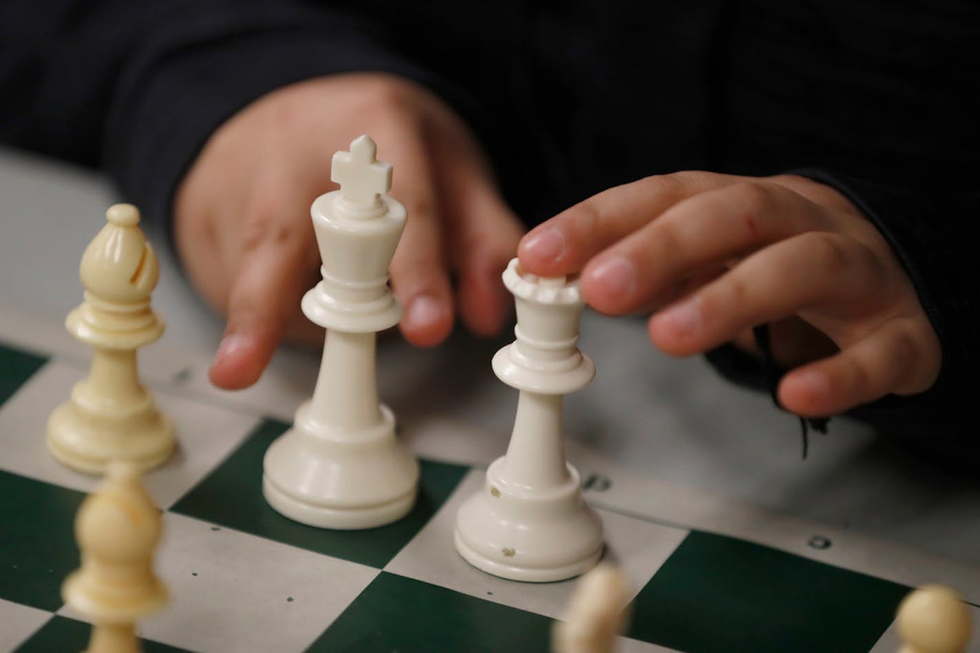 Alec Dennis,11, pondered his next move. The Burnsville Metcalf Junior High School chess team lost out on a national championship to a school from Texas that now is losing the title after an ethics review.