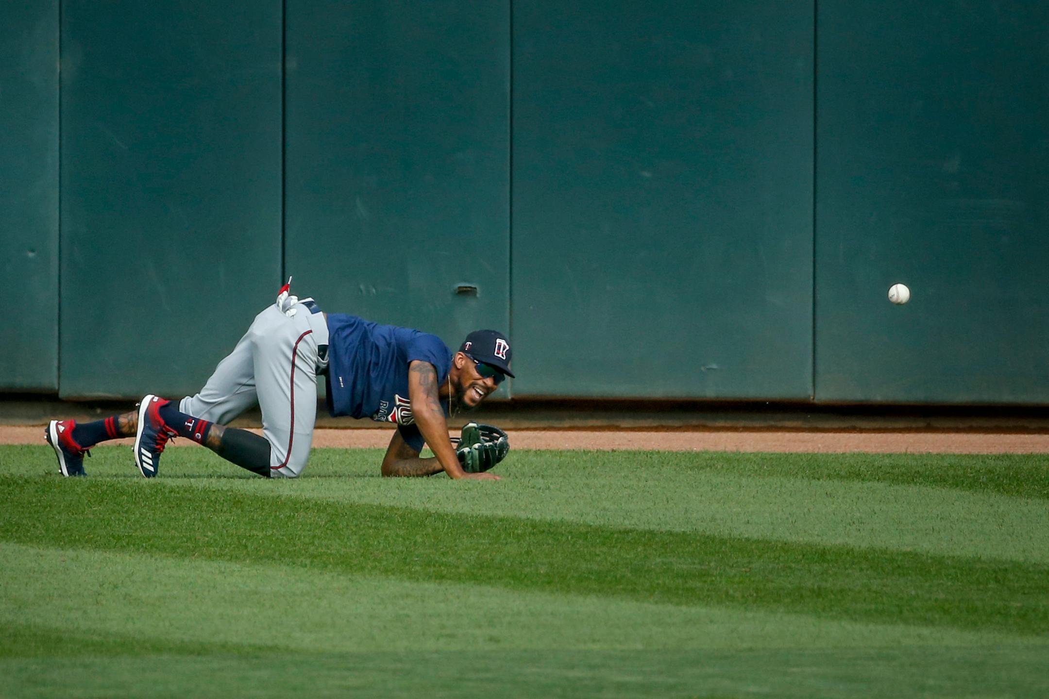 Twins center fielder Byron Buxton watched the ball drop after he stumbled during an intrasquad game Monday at Target Field. Buxton left the field via a golf cart because of an apparent foot injury.