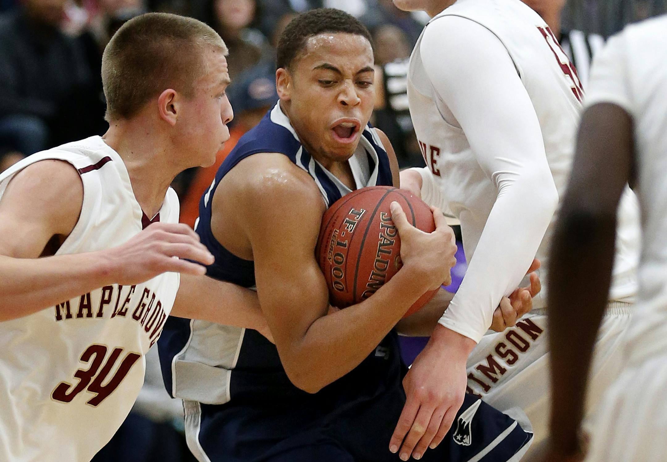 Senior guard J.T. Gibson sets the tone for Champlin Park, which showed league rival Maple Grove how effective its team-first basketball style can be. (Carlos Gonzalez, Star Tribune)