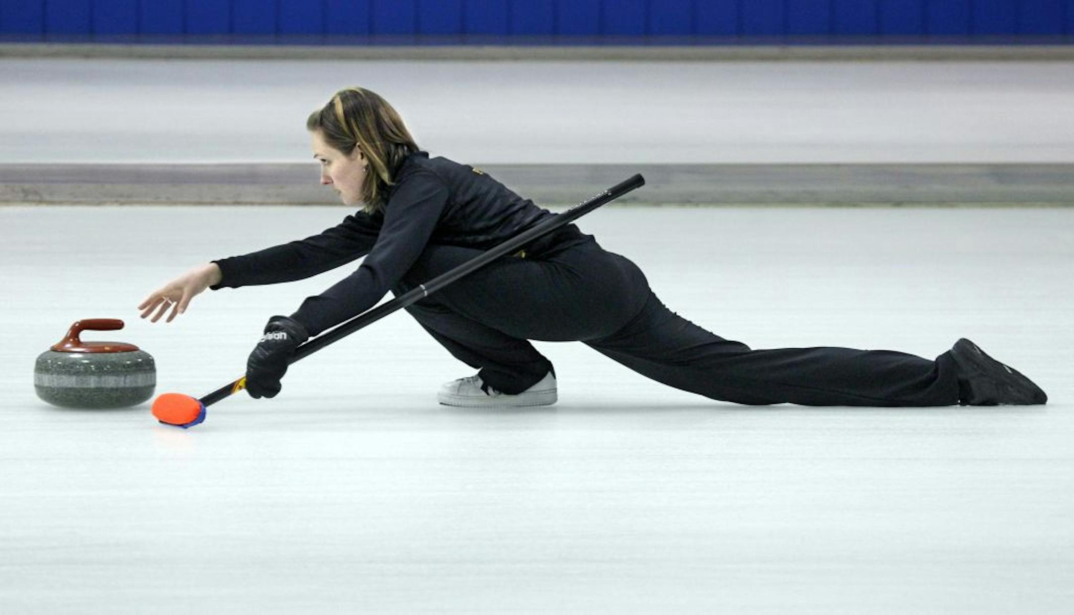Olympic curler, Cassie Potter, practiced at the St Paul Curling last week over her lunch hour, she'll be competing at the world championship event, march 17-25 [ TOM WALLACE • twallace@startribune.com _ Assignments # 20022413A_ March 6, 2011_ SLUG: body0312 _ EXTRA INFORMATION: she and her team finished 8th in the last Olympics and were 2nd in the world.