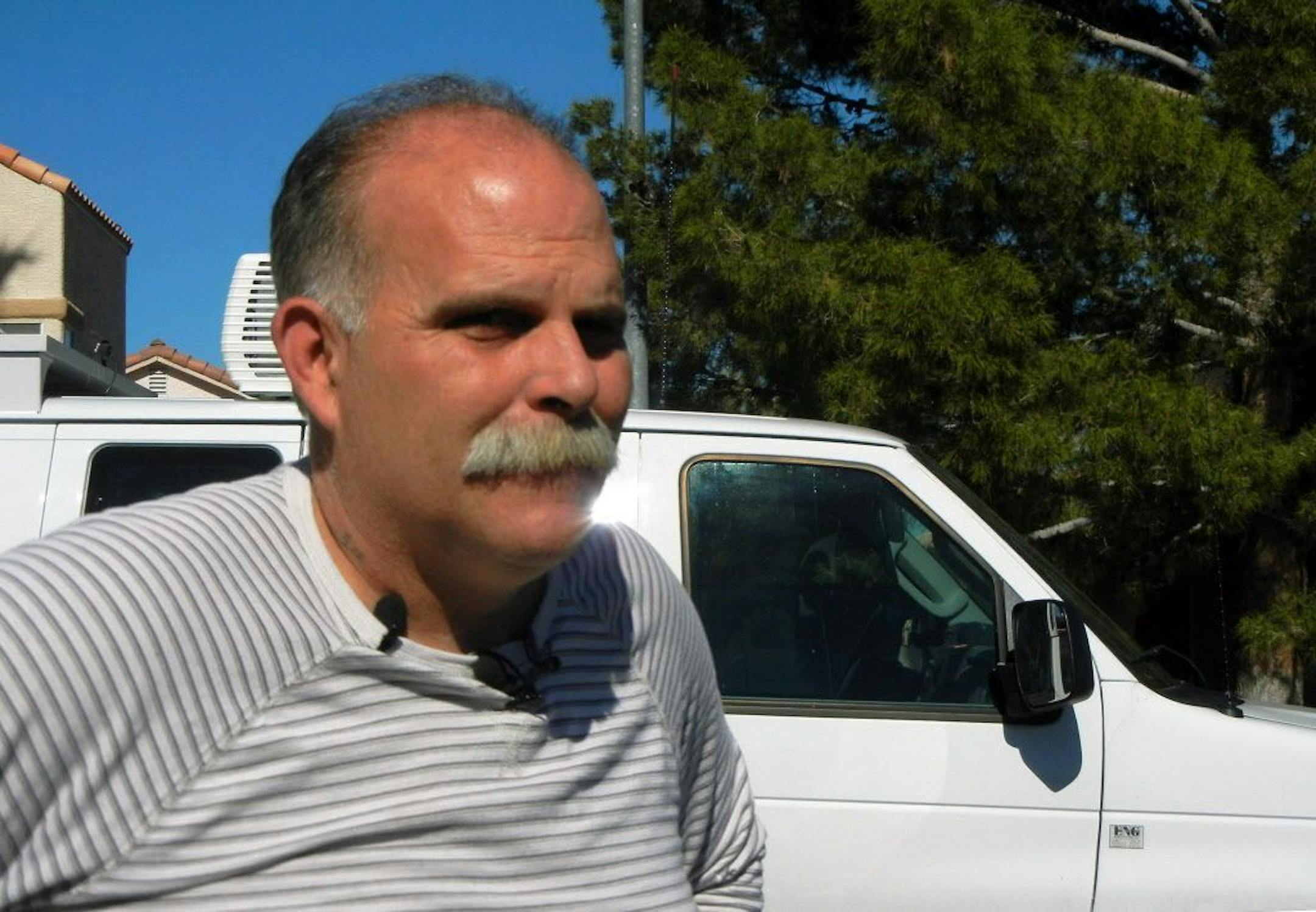 Robert Meyers speaks to media outside his house, Friday, Feb. 13, 2015 in Las Vegas. His wife Tammy was shot and killed in a road-rage incident.