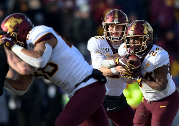 Quarterback Tanner Morgan (2) and running back Mohamed Ibrahim (24), both fifth-year redshirt seniors, are back to lead the Gophers offense this seaso