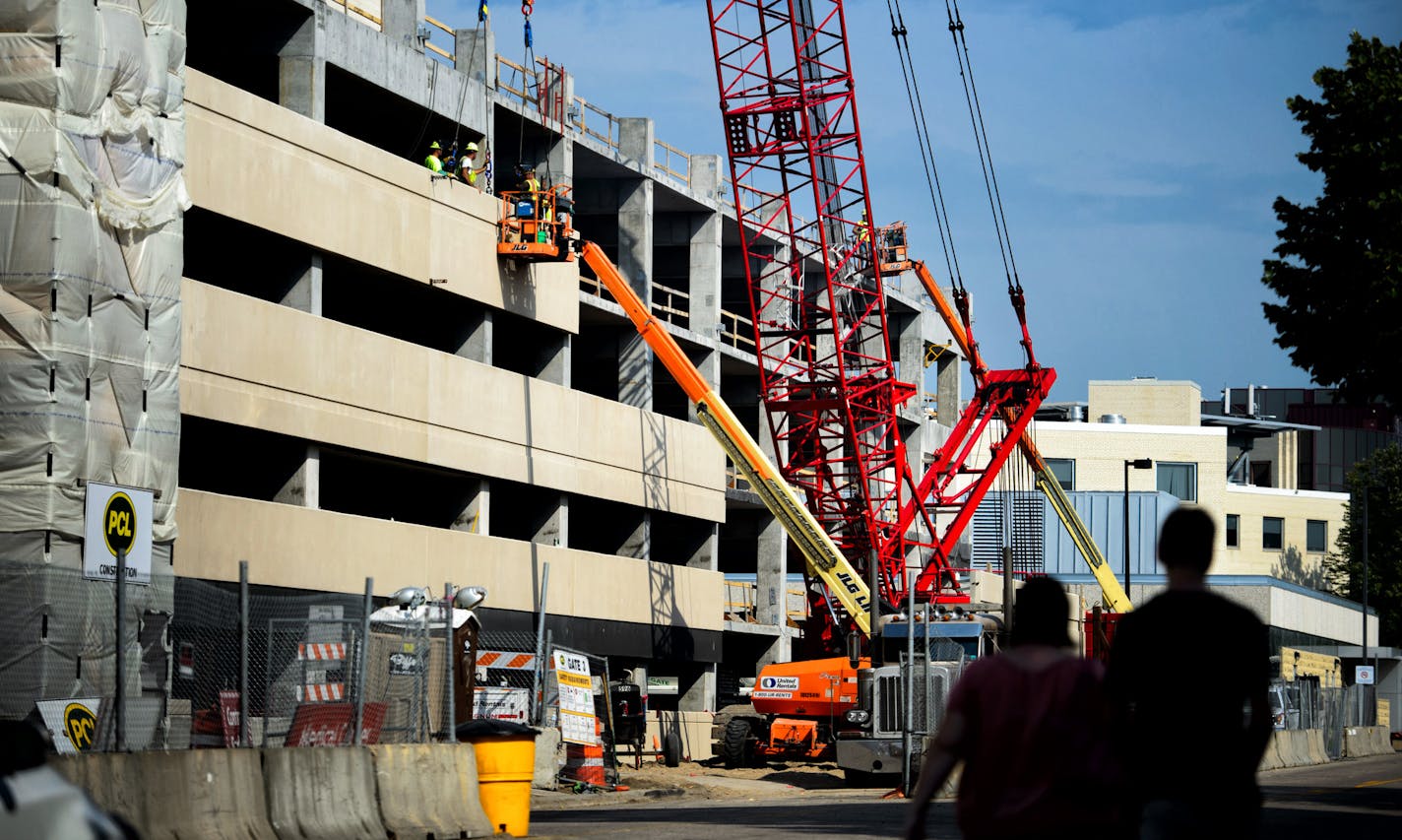 Southdale Medical Building parking ramp under construction. ] GLEN STUBBE * gstubbe@startribune.com Tuesday September 1, 2015 About-to-completed addition to the Southdale Medical Building at 6565 France Avenue. It's the "third and final" phase of the giant medical office complex, which dates back to the late 1950s and the opening Southdale Hospital. A main feature of the expansion is a huge new parking ramp. Paul Reinke of Silver Oak Development of Oakdale, MN has custom-designed the process to