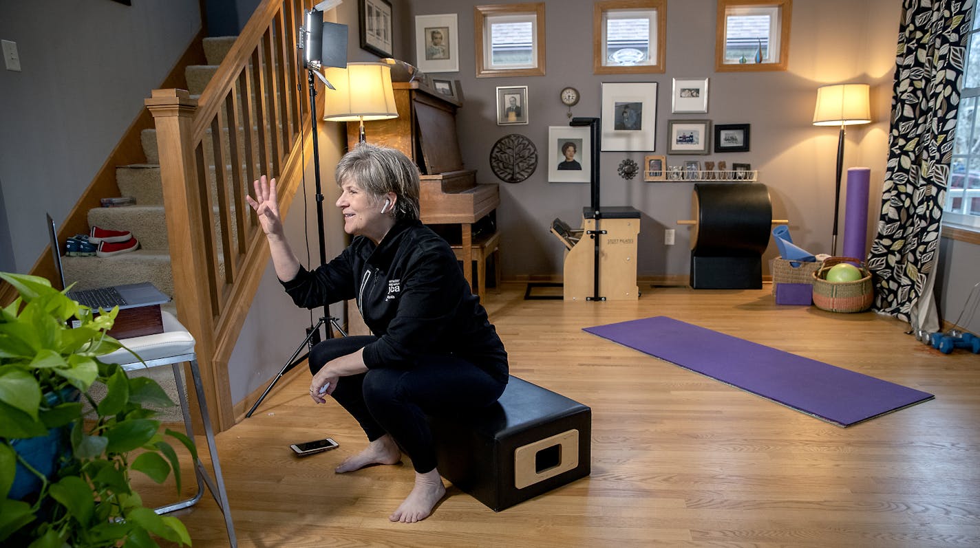 YWCA group fitness coordinator Kelli Klein participated in a virtual fundraiser by teaching a fitness class from her home living room, Wednesday, April 29, 2020 in Minneapolis, MN. ] ELIZABETH FLORES &#x2022; liz.flores@startribune.com