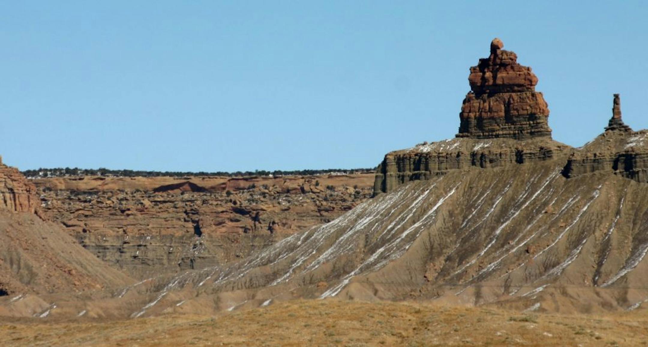 Sandstone towers glimmer in the distance at Ute Mountain Tribal Park near Cortez, Colo.