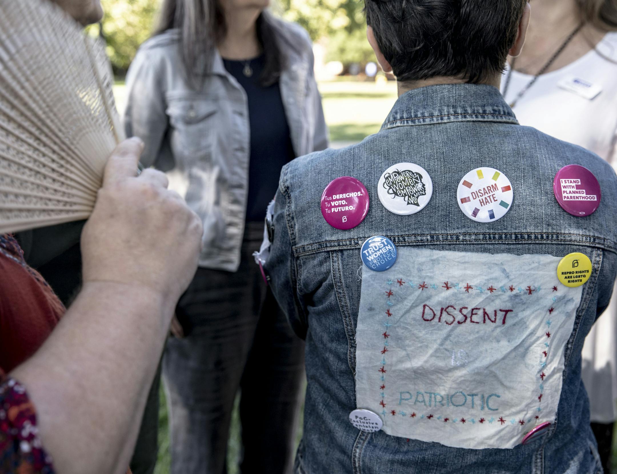 Jaden Donovan, a student at Austin Peay University and activist with the Gender Sexuality Alliance and Healthy Free Tennessee, wears her political stances on her denim jacket. MUST CREDIT: Photo for The Washington Post by Andrea Morales