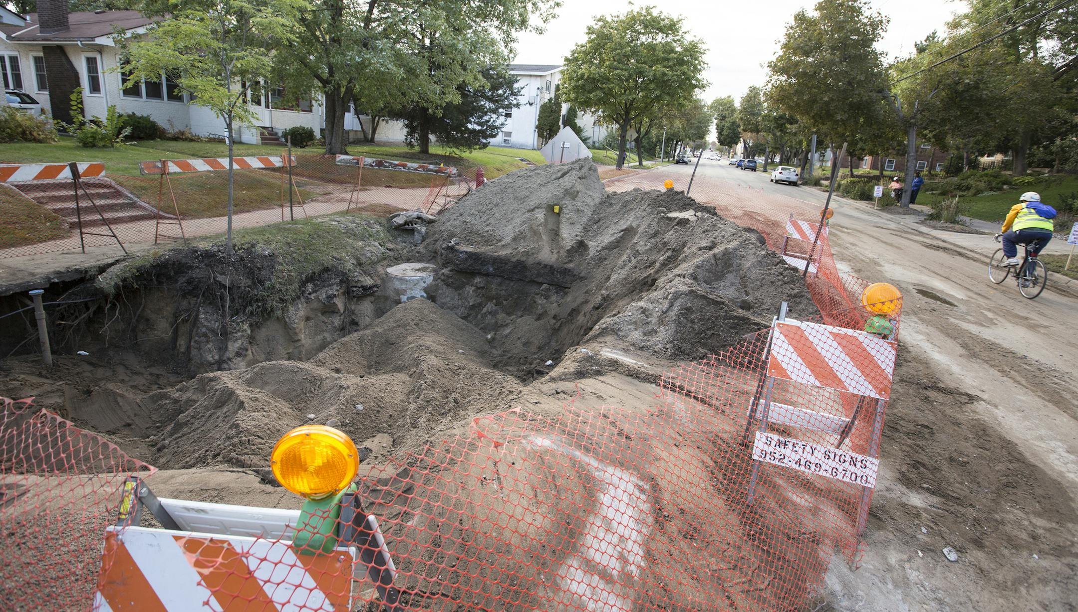 A water main broke Sunday under SE. 8th Street, causing a sinkhole. Service was restored that day but the area is closed to traffic until repairs are finished..