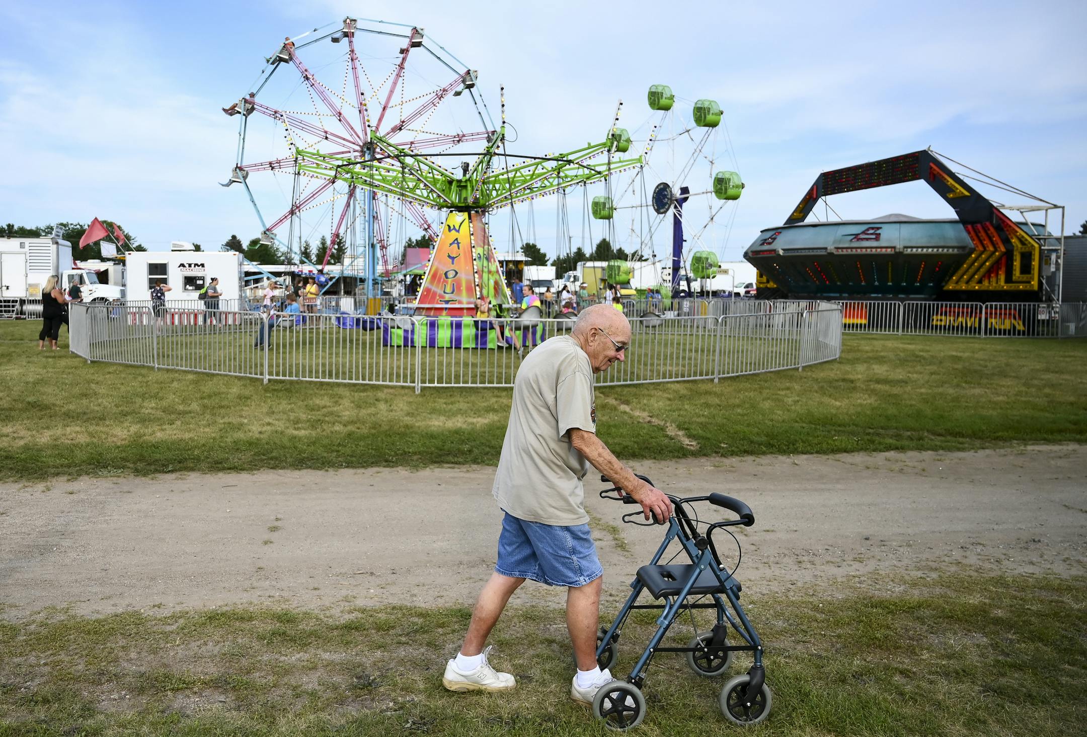 Don and Mary Koch, 85 and 83 respectively, of Litchfield, made their way back to their car after a visit to the Meeker County Fair Thursday night. "We went last year and discovered it's too much for us now," said Don of the State Fair. They plan on continuing to visit the Meeker County fair, which is easier to get around. ] Aaron Lavinsky ¥ aaron.lavinsky@startribune.com In just a couple of weeks, the annual get together that is the Minnesota State Fair will be underway. But there's a diffe