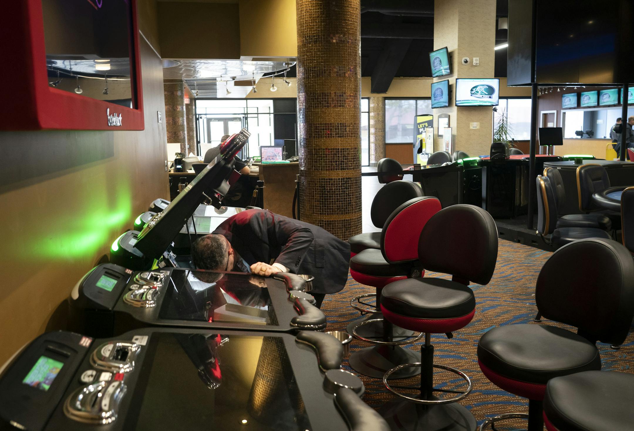 Vice president of card casino Michael Hockman worked to shut off $1 blackjack screens that had just been debuted last week at Canterbury Park in Shakopee, Minn., on Monday, March 16, 2020 in response to concerns about COVID-19. Canterbury Park is traditionally open 24/7 only closing annually for 12 hours over Christmas. ] RENEE JONES SCHNEIDER ¥ renee.jones@startribune.com