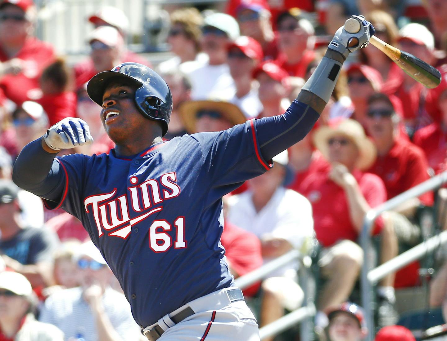 Minnesota Twins's Miguel Sano follows through on a two-run home run in the sixth inning of an exhibition spring training baseball game against the St. Louis Cardinals, Saturday, March 14, 2015, in Jupiter, Fla. (AP Photo/John Bazemore)