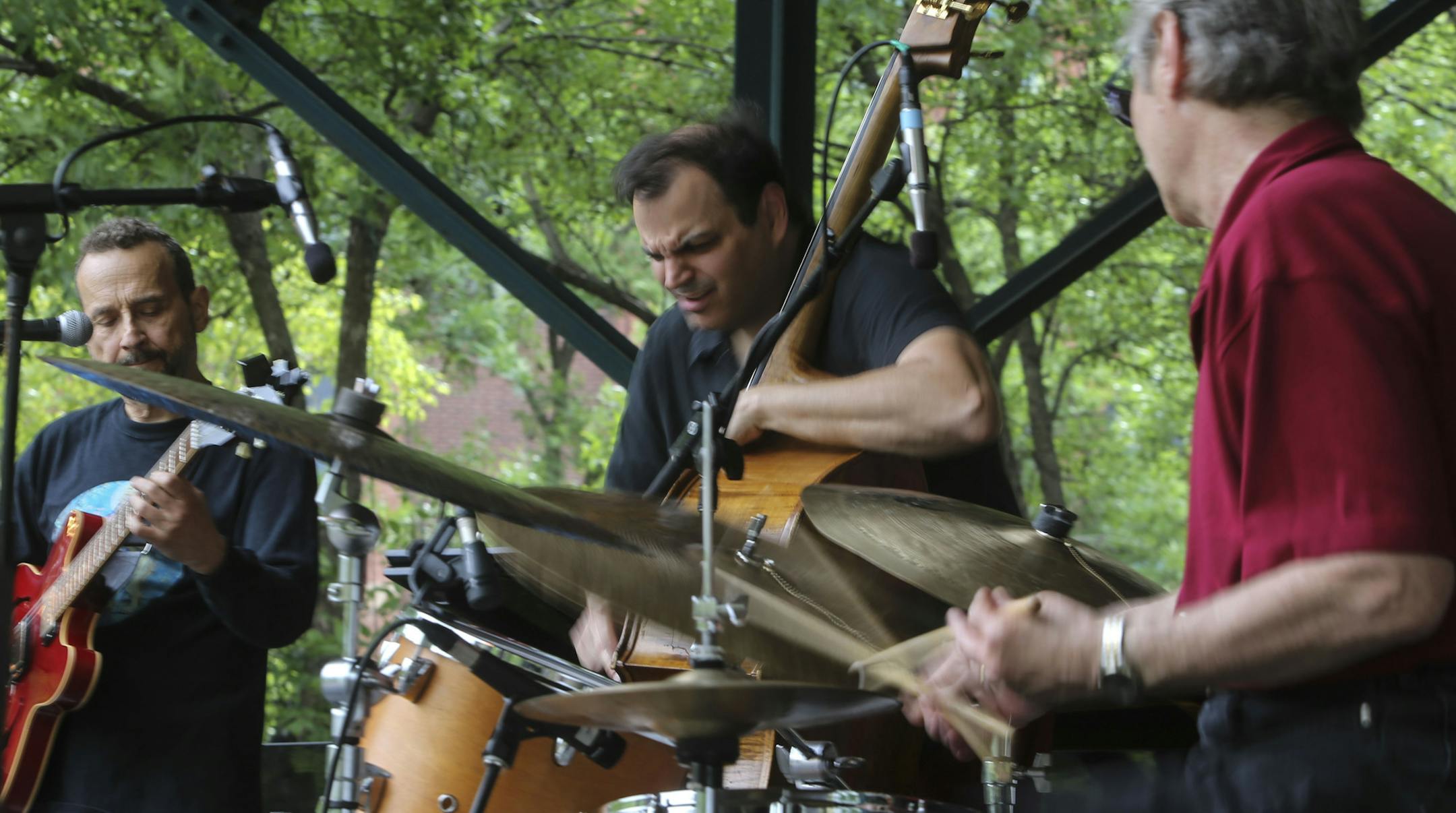 Red Planet, including guitarist Dean McGraw, bass player Chris Bates and drummer Jay Epstein took to the stage at the St. Paul Jazz Fest Friday, June 27, 2014, in Mears Park in St. Paul, MN.] (DAVID JOLES/STARTRIBUNE) djoles@startribune St. Paul Jazz Fest Friday, June 27, 2014at Mears Park in St. Paul, MN.