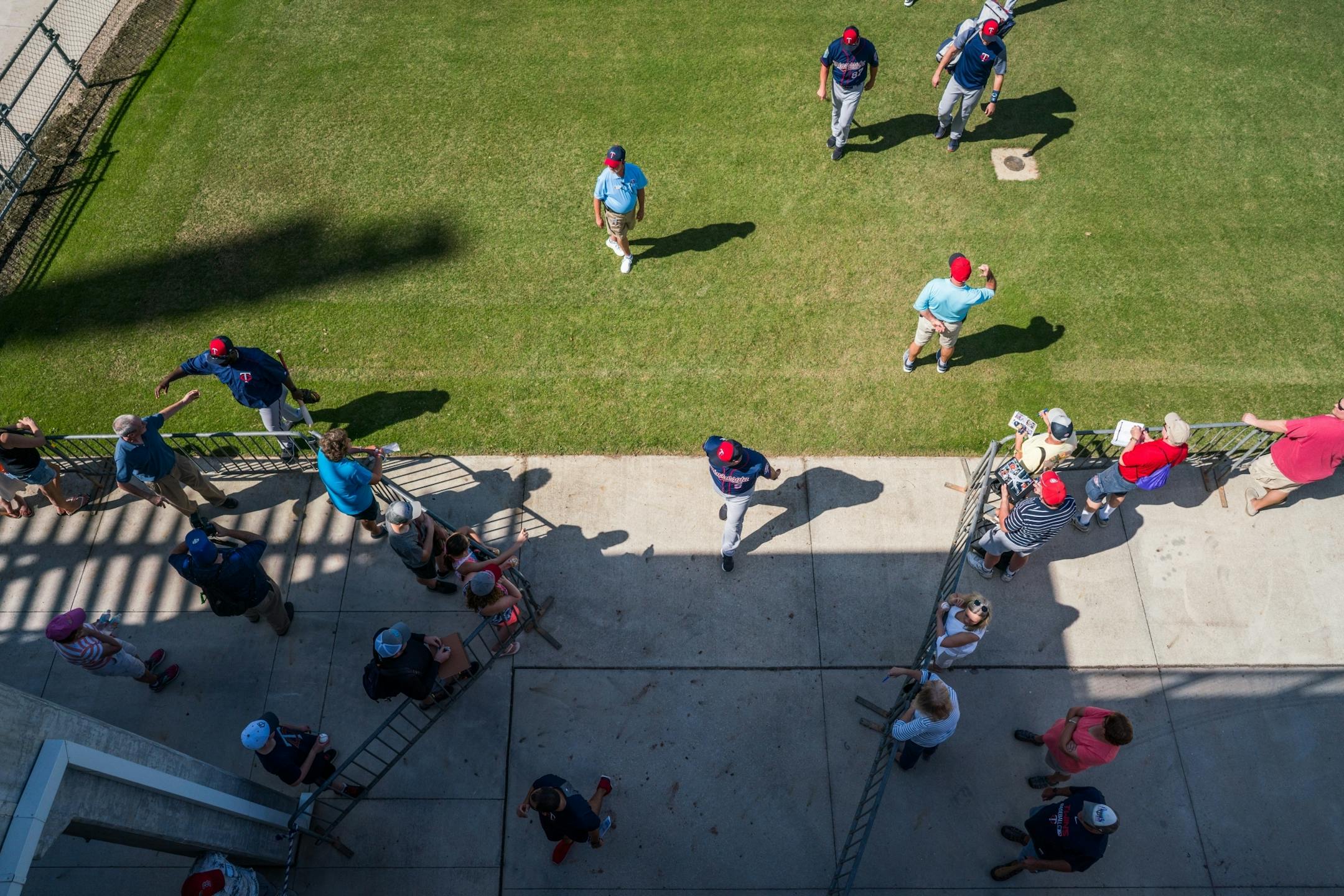 Twins players make their way back to the clubhouse after a second day of workouts.