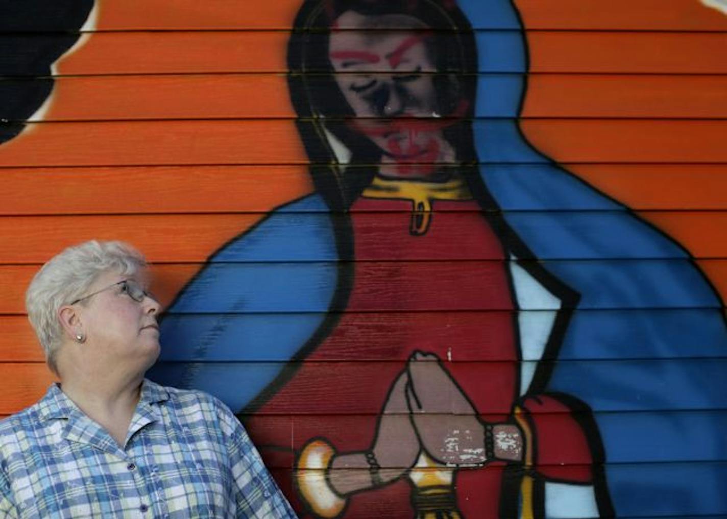 To deter graffiti artists, Anna-Marie Byrne had her south Minneapolis garage painted with a mural of Our Lady of Guadalupe, which someone defaced. Byrne was tagged yet again, by the city: Her garage had been cited and she must clean it up.