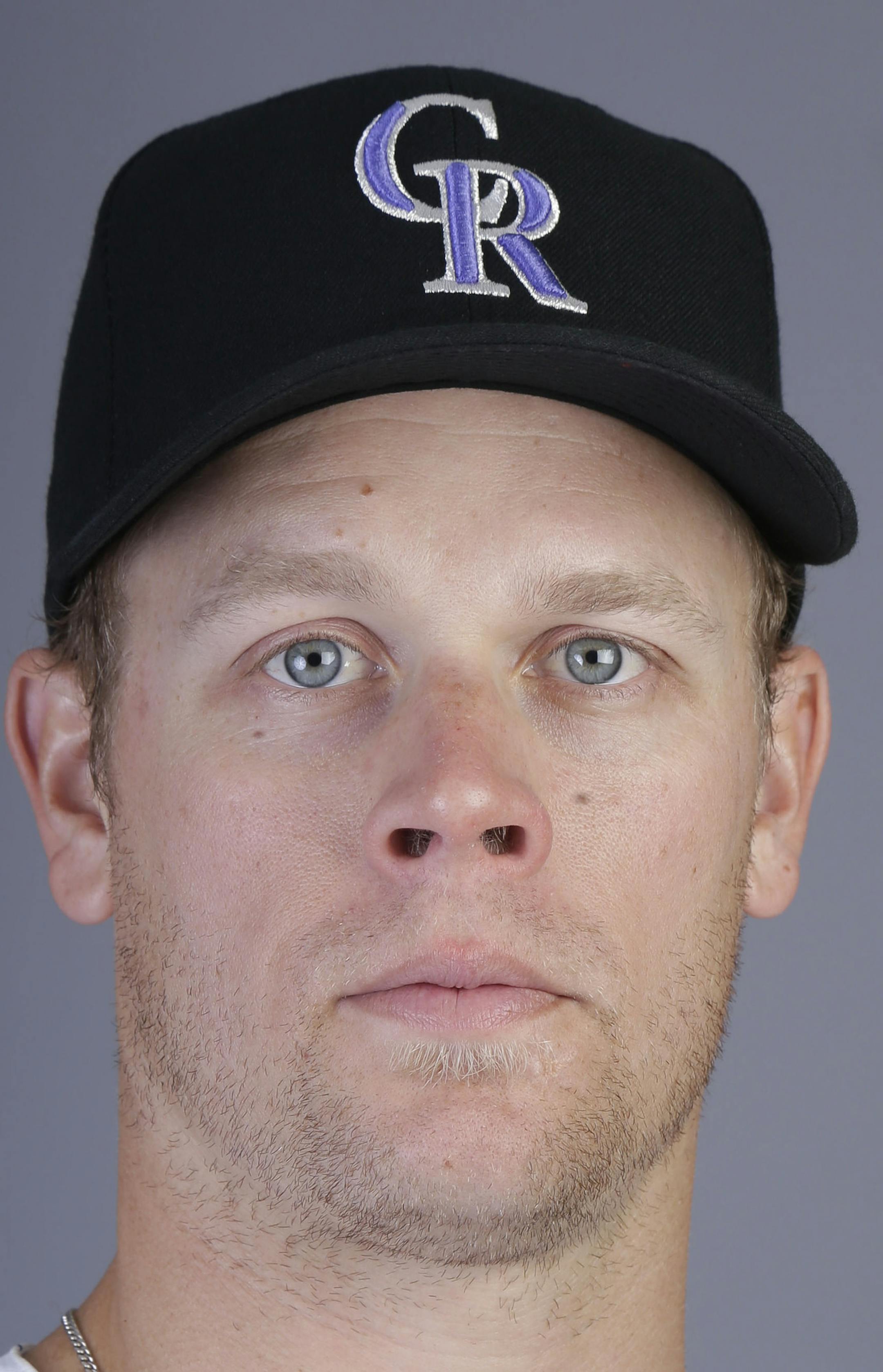 This is a 2014 photo of Justin Morneau of the Colorado Rockies baseball team. This image reflects the Rockies active roster as of Wednesday, Feb. 26, 2014, when this image was taken. (AP Photo/ Gregory Bull) ORG XMIT: AZGB10