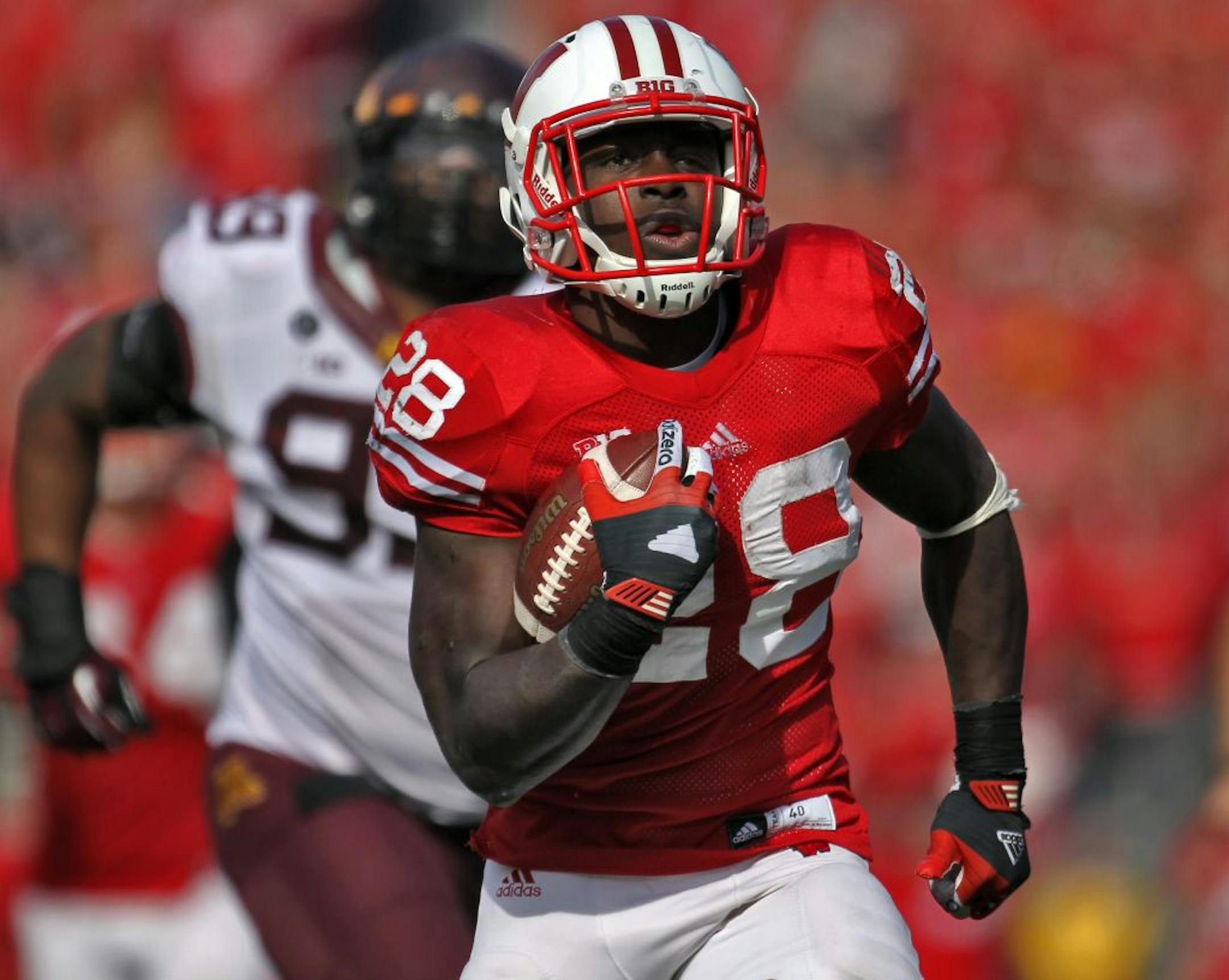 Minnesota Gophers vs. Wisconsin Badgers. Wisconsin won 38-13. Wisconsin running back Montee Ball left Minnesota defender Ra'Shede Hageman (99) behind as he rambled for his second touchdown of the game in 2nd half action. (MARLIN LEVISON/STARTRIBUNE(mlevison@startribune.com