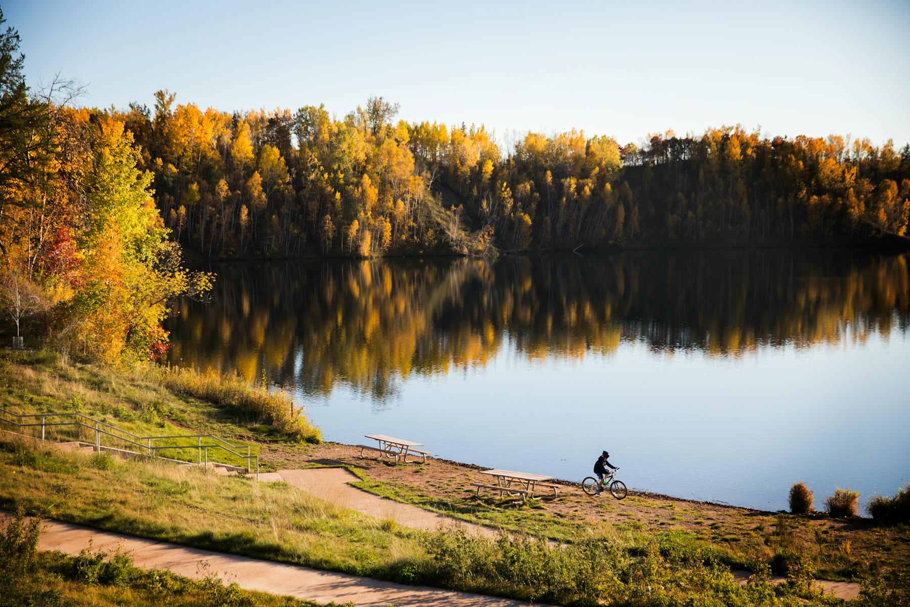 A biker rides near the Rally Center at Cuyuna Country State Recreation Area in 2017. Former mines in that area are among the deepest lakes in the stat