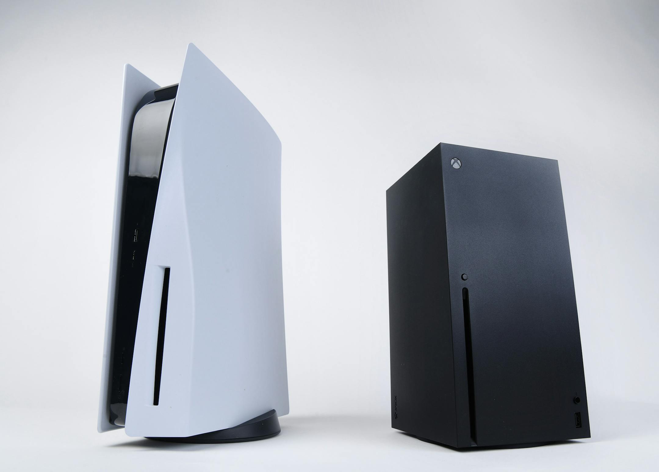 The recently released Sony Playstation 5, left, and the Microsoft Xbox Series X, photographed in Walnut Creek, Calif., on Thursday, Oct. 29, 2020. (Jose Carlos Fajardo/Bay Area News Group/TNS) ORG XMIT: 1821922