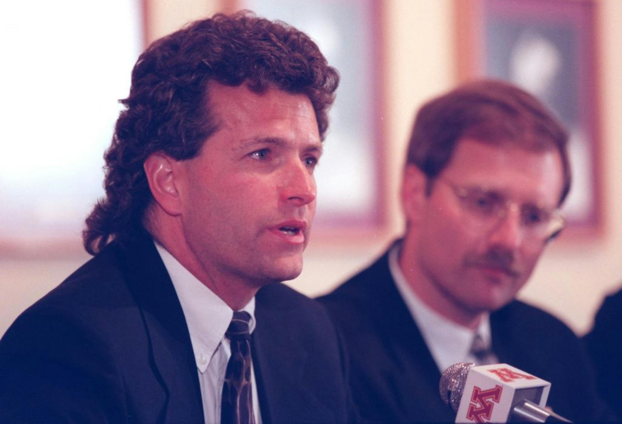 Don Lucia, new U of M Hockey coach and U of M Athletic Dir Mark Dienhart during a press confrence at Mariucci Arena -- Don Lucia, new U of M Hockey coach and U of M Athletic Dir Mark Dienhart during a press confrence at Mariucci Arena