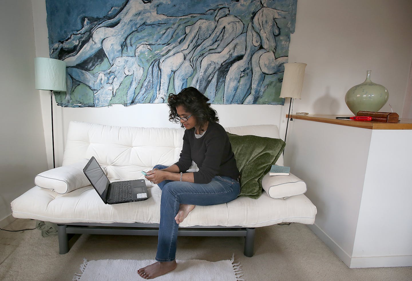 Robyne Robinson worked from her home office, Friday, February 6, 2015 in Minneapolis, MN. More people are carving out space in their homes for offices that help them get the job done while providing the comforts of home. ] (ELIZABETH FLORES/STAR TRIBUNE) ELIZABETH FLORES &#x2022; eflores@startribune.com