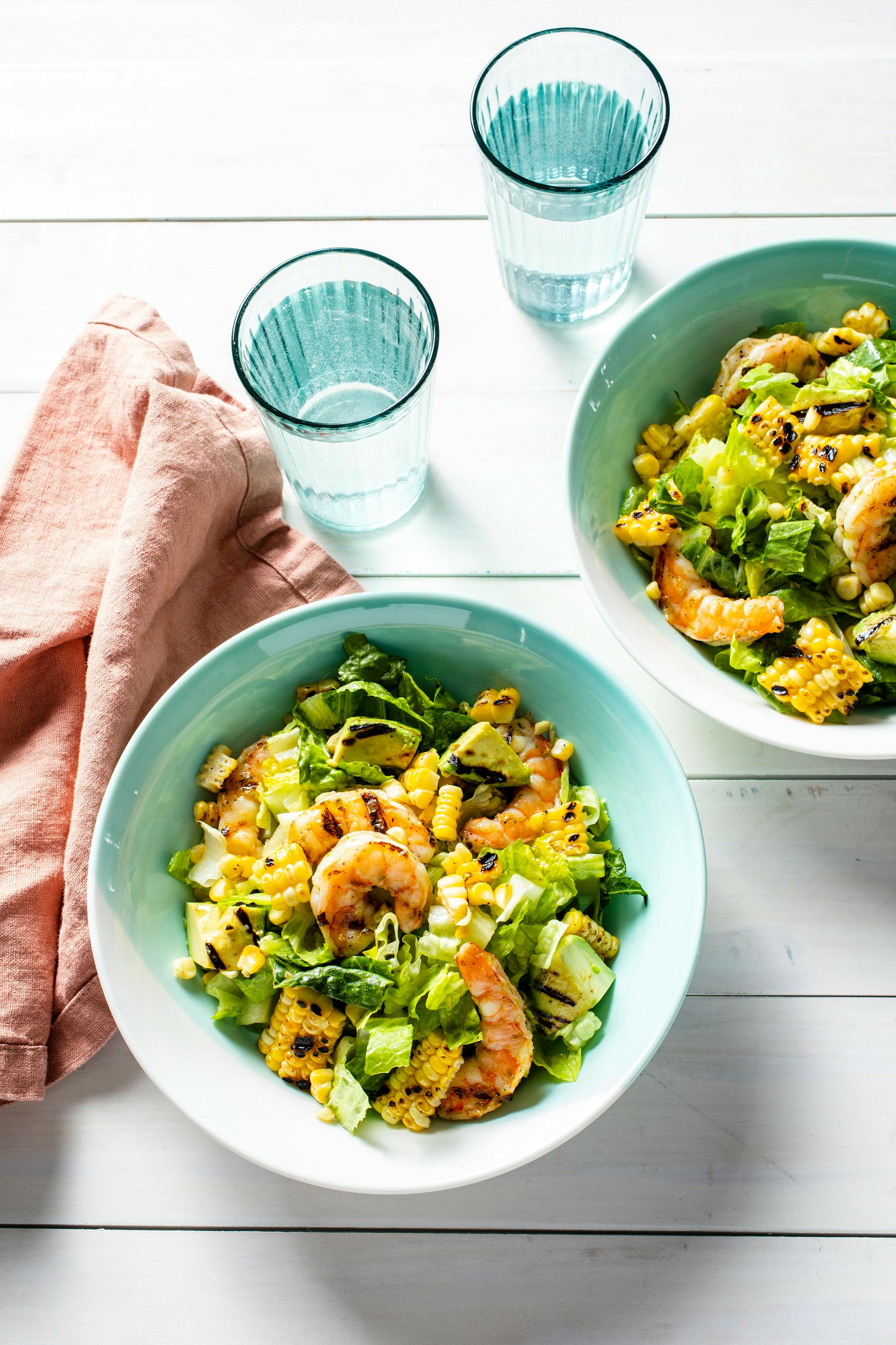 Grilled Shrimp, Corn, and Avocado Salad from "The Outdoor Cook: How to Cook Anything Outside" by America's Test Kitchen (2023, $30).Photo: Kevin White