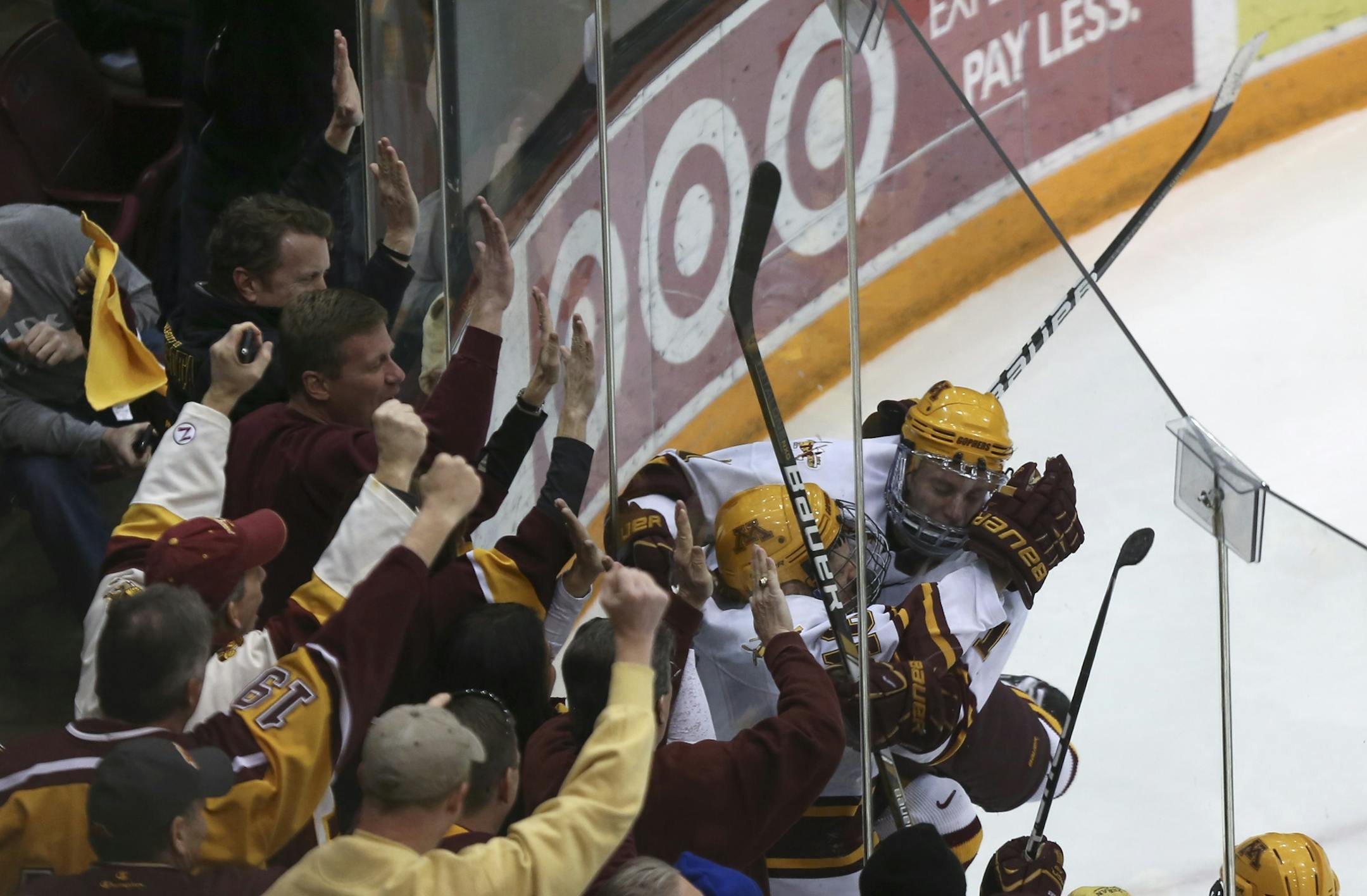 Minnesota's Nate Condon and Sam Warning celebrated after Condon scored on North Dakota earlier this season.