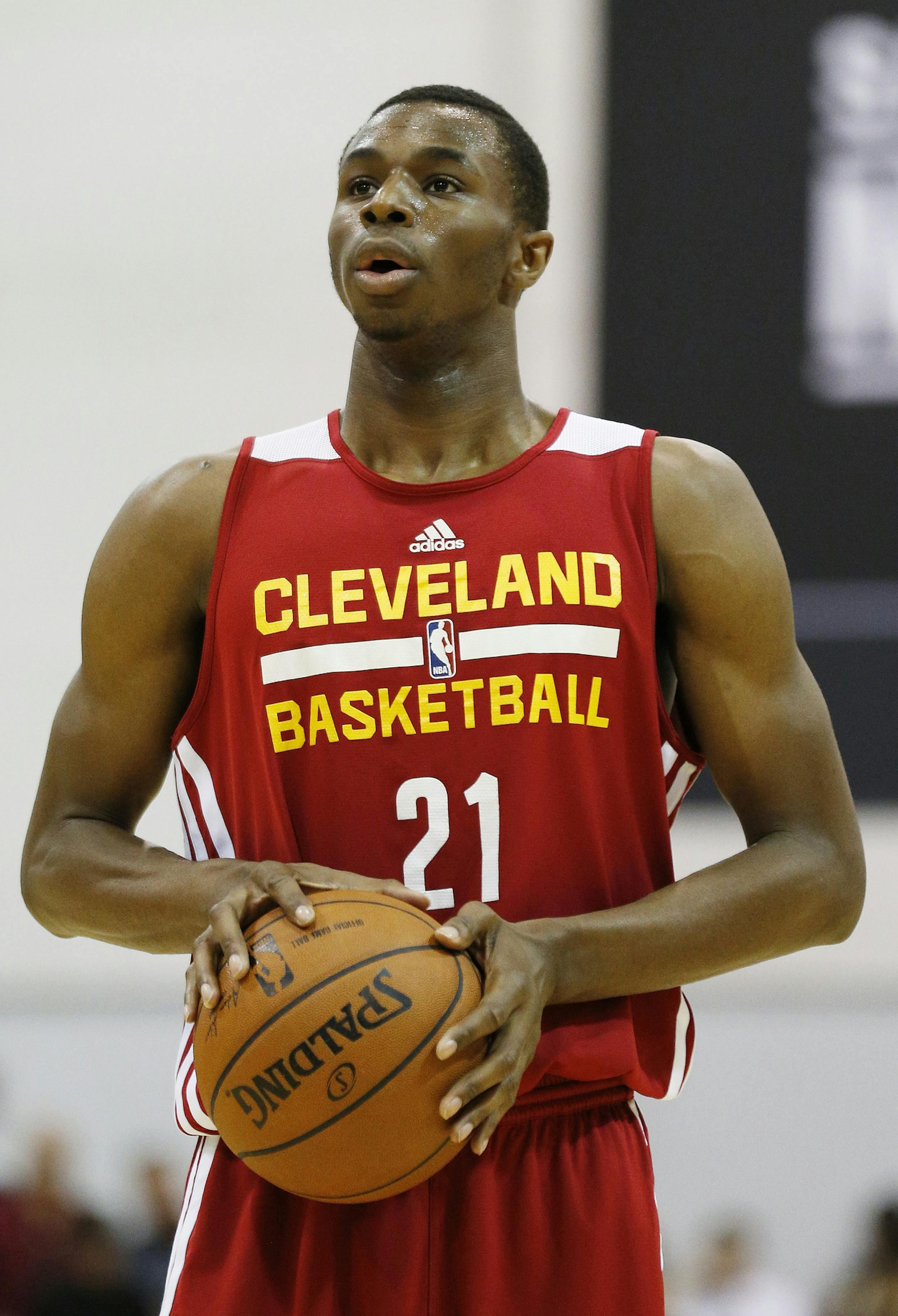 Andrew Wiggins of the Cleveland Cavaliers prepares to take a free throw against the Milwaukee Bucks in an NBA summer league basketball Friday, July 11, 2014, in Las Vegas. (AP Photo/John Locher)