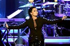 Singer Demi Lovato performs at the Los Angeles Convention Center in February.