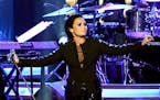 Singer Demi Lovato performs at the Los Angeles Convention Center in February.