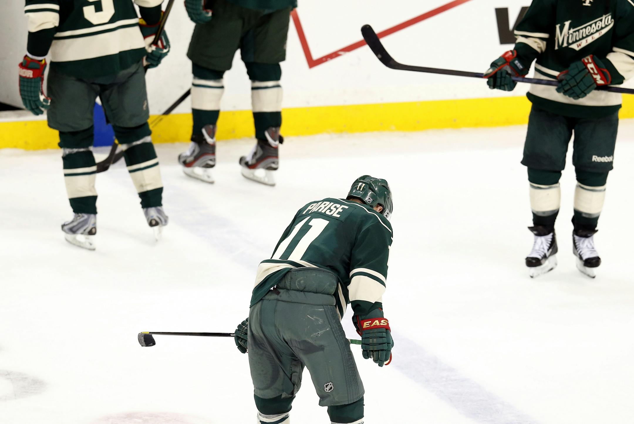 Zach Parise and teammates skated off the ice after losing to Chicago 1-0.