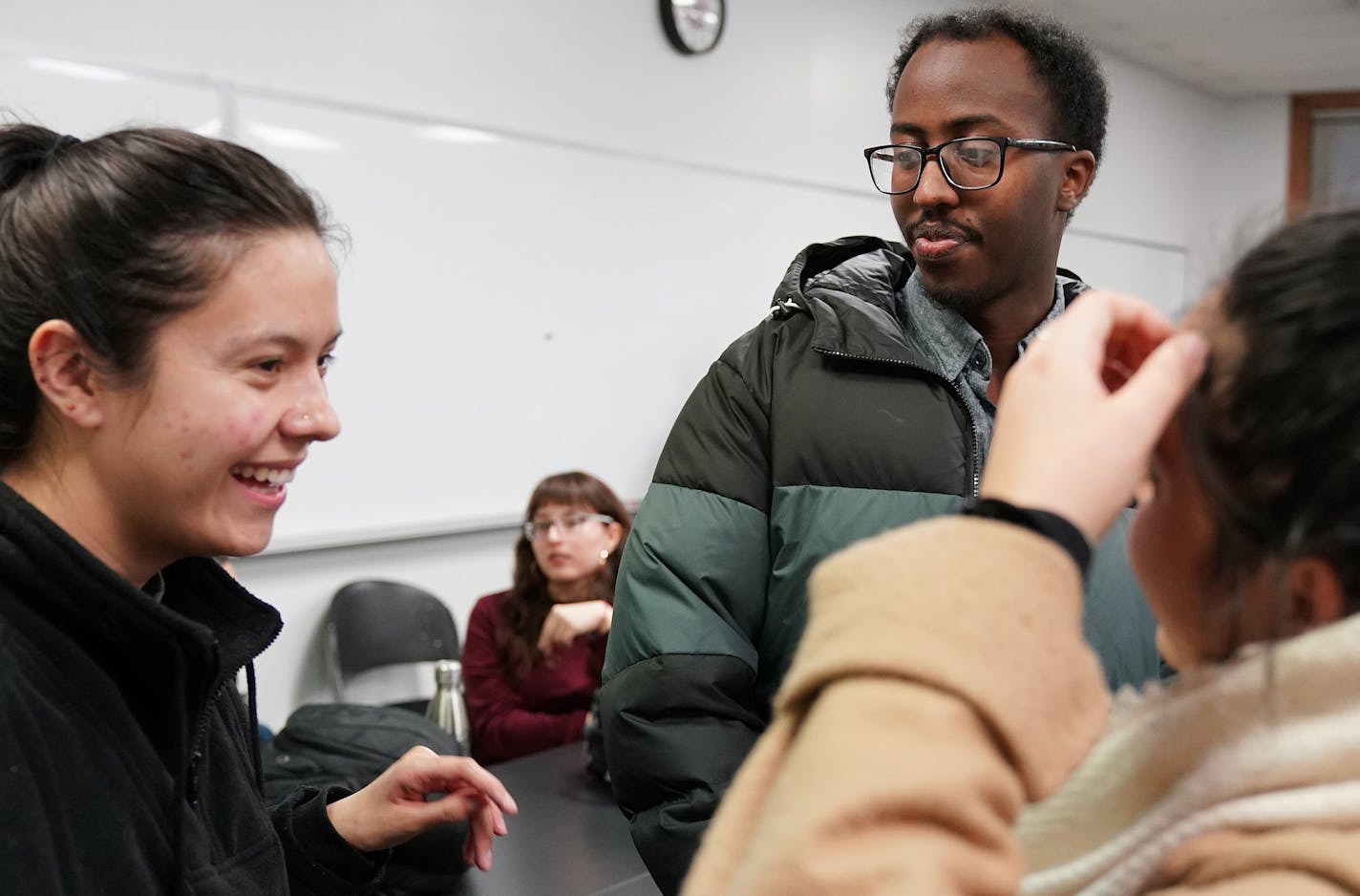 Zakariya Abdullahi, center, joked with his classmate Natalya Arevalo. ] ANTHONY SOUFFLE &#x2022; anthony.souffle@startribune.com Zakariya Abdullahi, a Somali-American student at Augsburg University, met with fellow students to study together for a math class in one of the Hagfors Center's group study areas Wednesday, Nov. 28, 2018 in MinneapolisMore students of color than white students attend Augsburg University this fall - a demographic shift virtually unheard of in higher education, particula