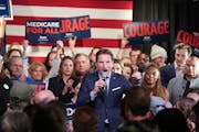 Dean Phillips takes the stage at his election night party after a stronger showing than expected in the New Hampshire primary Tuesday, Jan. 23, 2024  