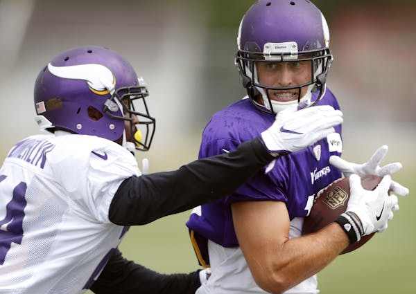 Adam Thielen caught a pass over Captain Munnerlyn during practice Thursday August 4, 2016 in Mankato, MN.] The Minnesota Vikings held practice at Minn