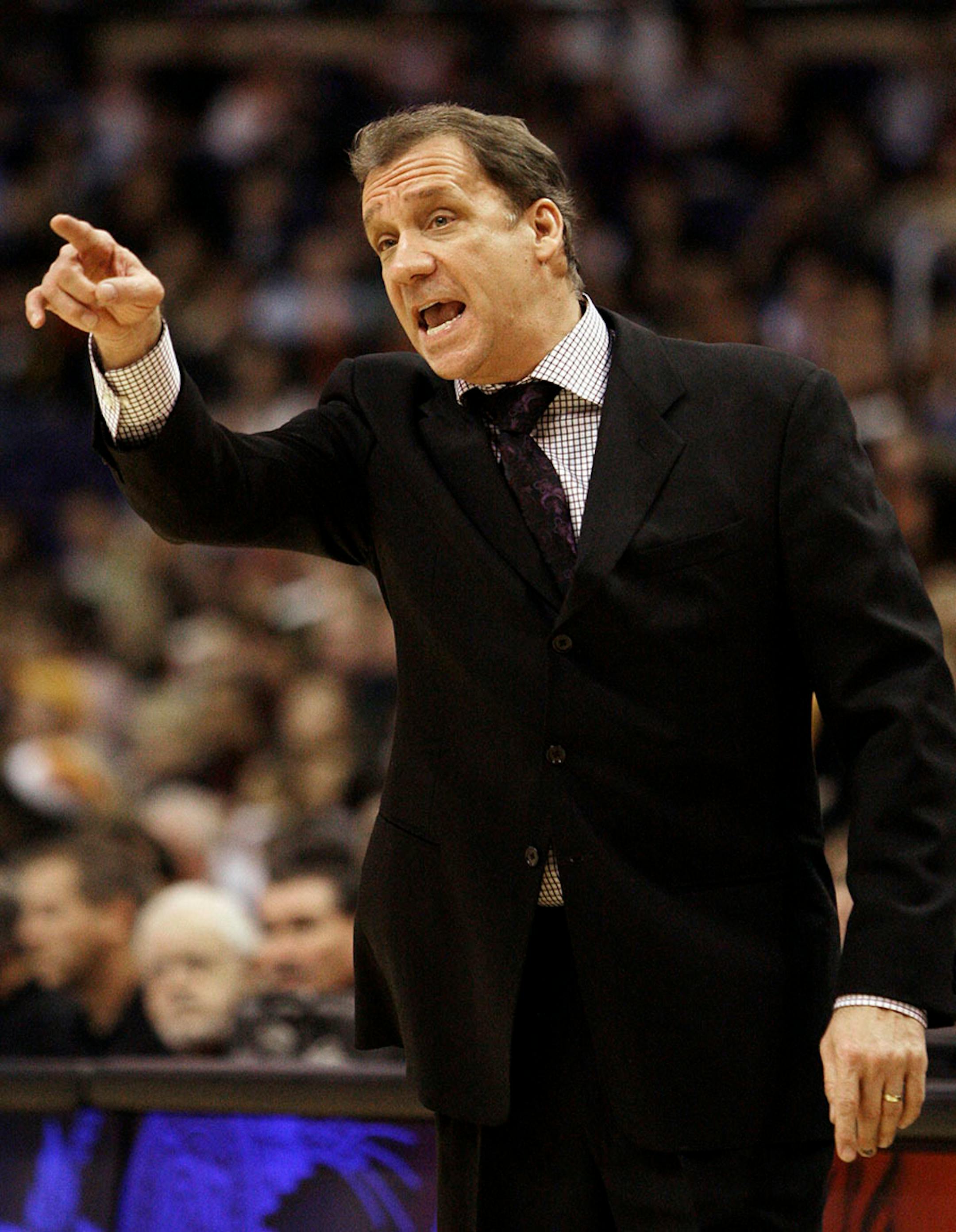 Washington Wizards' Flip Saunders argues with officials in the first quarter of an NBA basketball game against the Phoenix Suns, Saturday, Dec. 19, 2009, in Phoenix.
