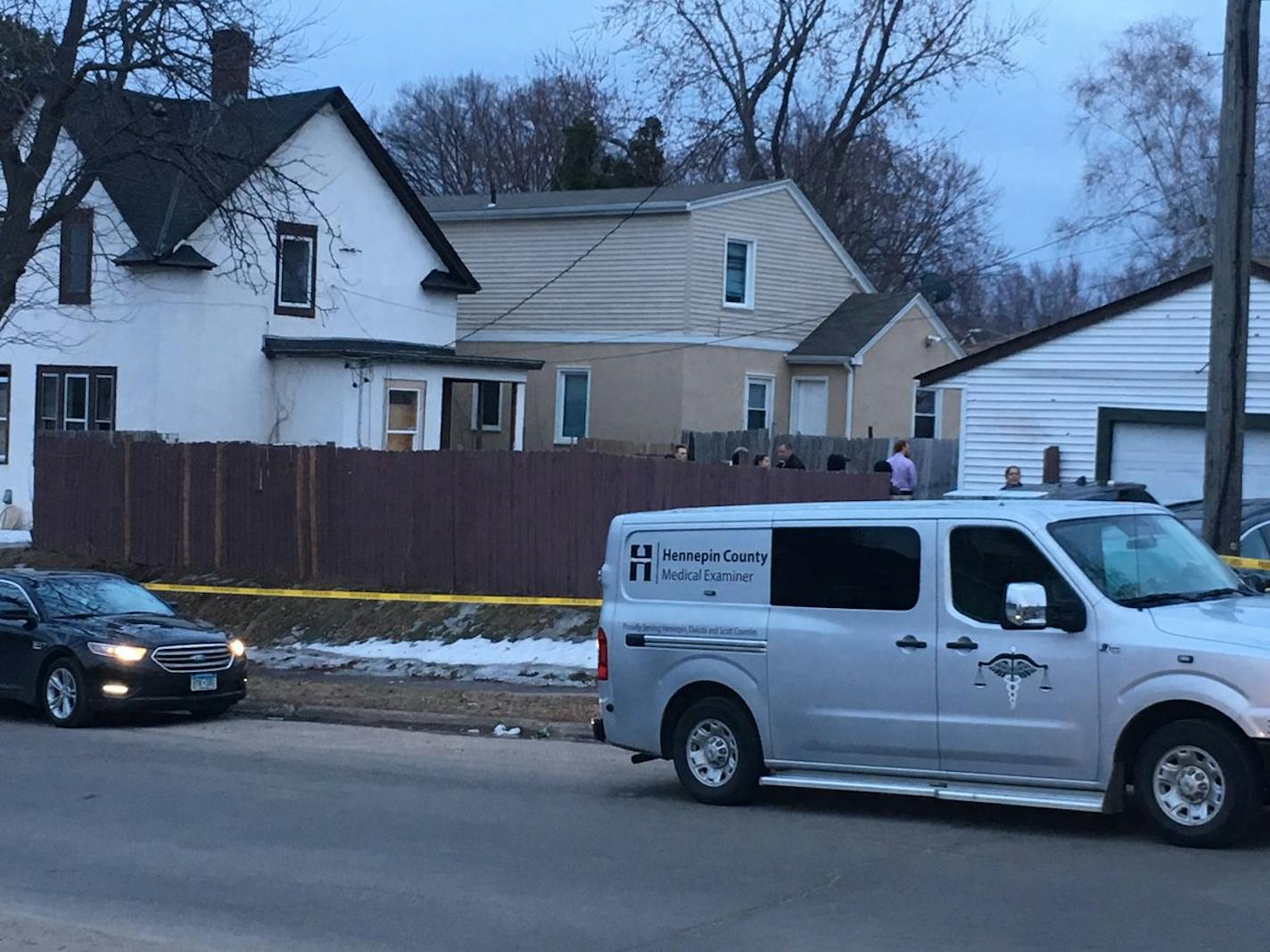 The Hennepin County medical examiner's office was on the scene with about a dozen other investigators in the yard near N. 36th and Dupont avenues.