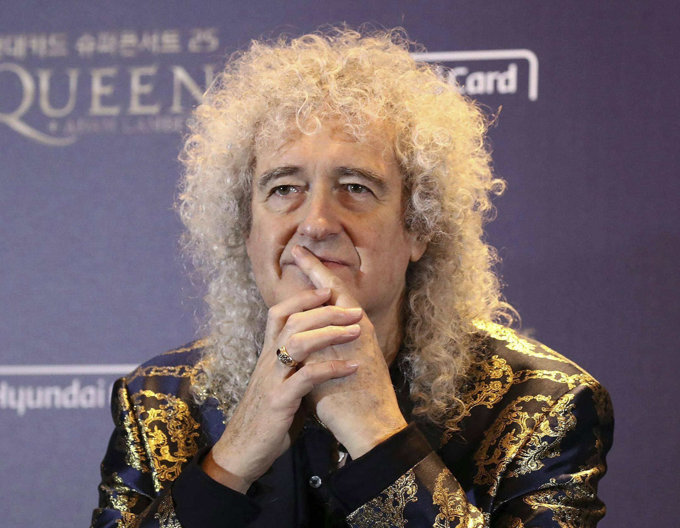 FILE - In this Jan. 16, 2020 file photo, Brian May, of Queen, attends a press conference ahead of the Rhapsody Tour at a hotel in Seoul. May said he recently had three stents put in after experiencing "a small heart attack." The guitarist said Monday, May 25 in an Instagram video that the stents were put in after his doctor drove him to a hospital after he starting experiencing symptoms. (Chung Sung-Jun/Pool Photo via AP)