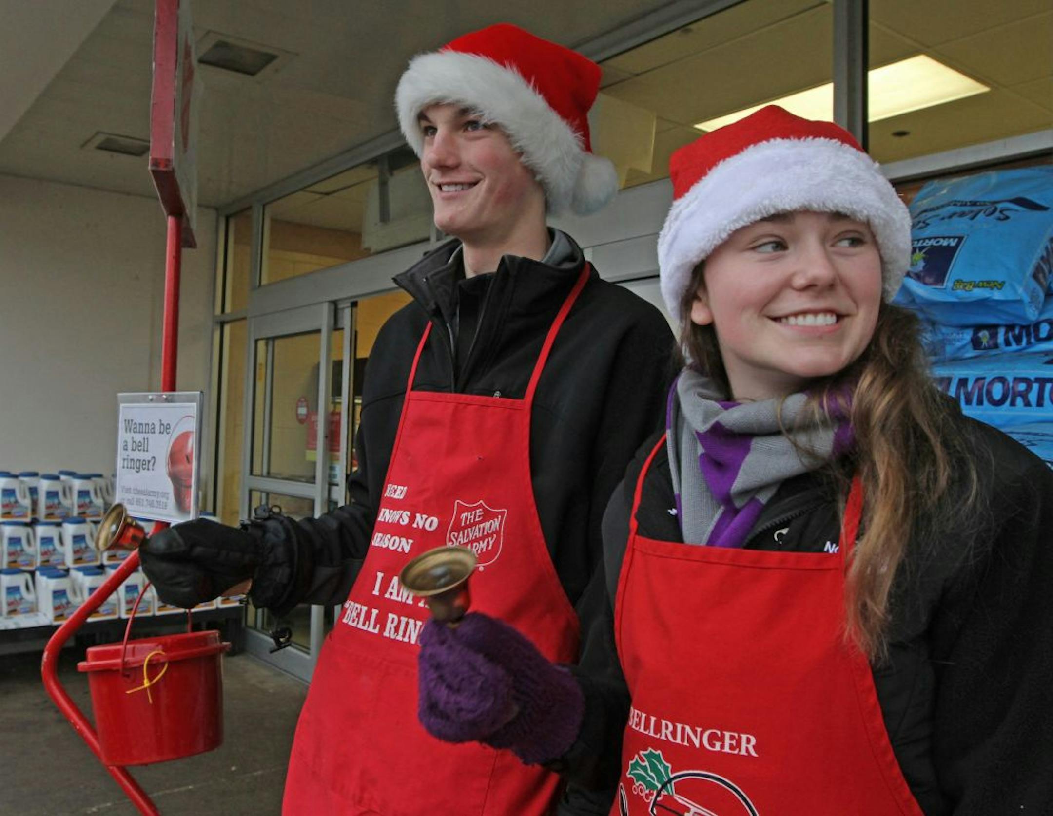Tyler Schmidt and Jane Becker, both seniors at Roseville High School, rang bells for the Salvation Army outside a Maplewood Cub Foods earlier this month.