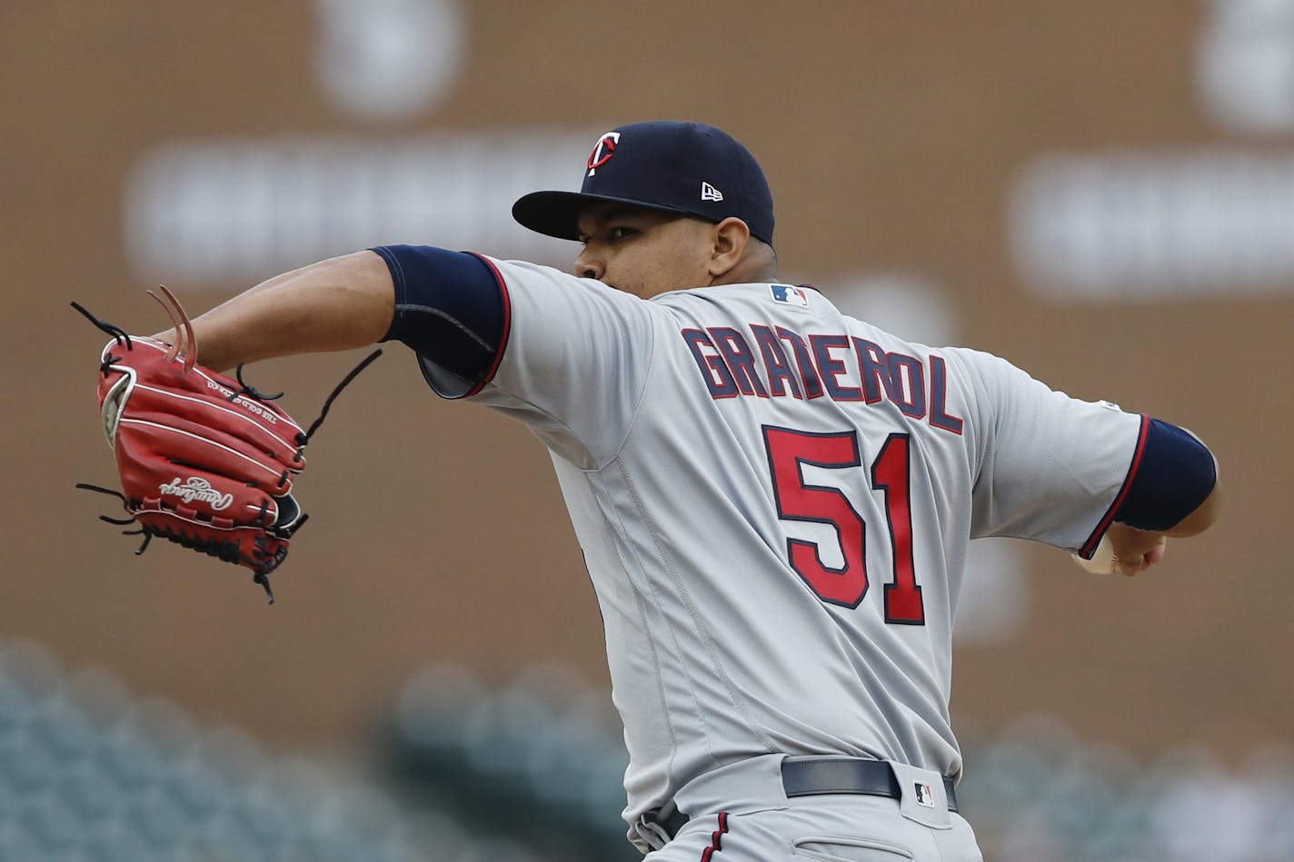 Minnesota Twins relief pitcher Brusdar Graterol throws his first MLB pitch during the ninth inning of a baseball game against the Detroit Tigers, Sunday, Sept. 1, 2019, in Detroit. (AP Photo/Carlos Osorio)