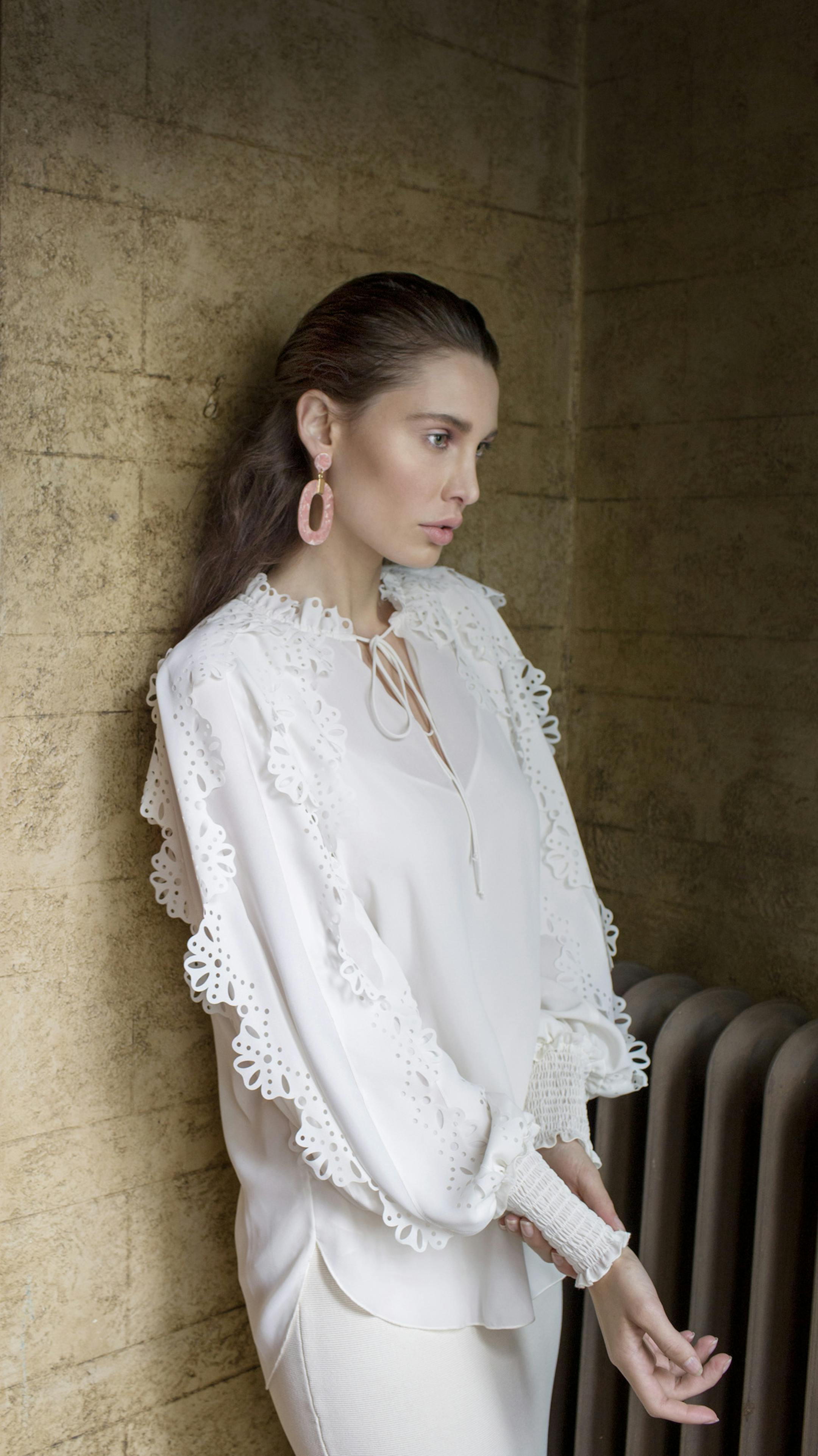 Picture Perfect: Finding refinement in a rustic remodel Walled Entry
Chloe shirt $425 nordstrom.com
Rachel Zoe Almond milk skirt $125 macys.com
Rush Earrings $13 tjmaxx.com Photographer: Joel Larson
Creative Director and Stylist: Barbara Schmidt, studiobstyle
Hair and Makeup Artist: Andrea Holton
Model Julianne Steege, Ignite Models