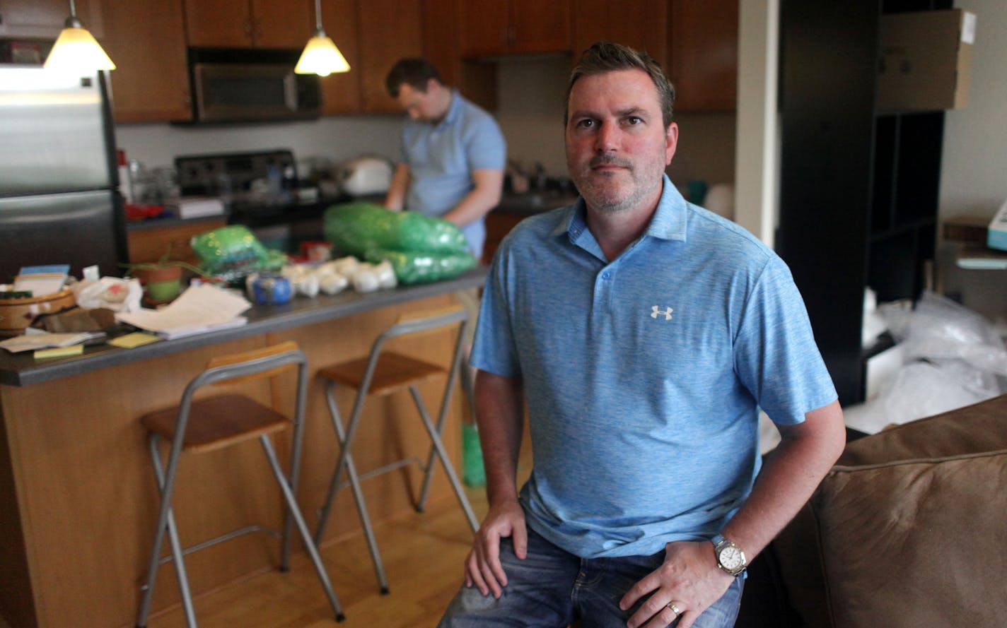 Chris Willette, a real estate agent with Edina Realty, sits for a portrait on Thursday afternoon in a condo on Clinton Avenue that he just sold. MONICA HERNDON monica.herndon@startribune.com Minneapolis, MN 06/05/2014