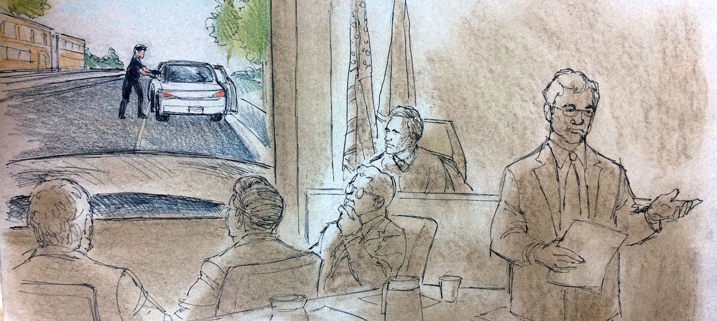 Jeronimo Yanez and his defense team looked on at dashcam footage played during Assistant Ramsey County Attorney Richard Dusteroft during opening arguments for Yanez's trial in the fatal shooting of Philando Castile on June 5.