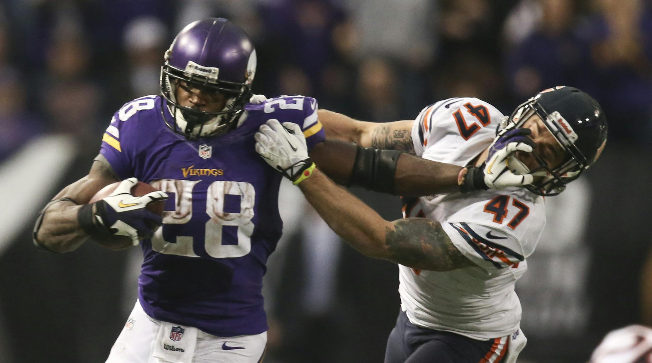Adrian Peterson stiff-armed Chicago free safety Chris Conte as he gained 21 yards on an overtime run. Conte was penalized for a horse-collar tackle on the play.