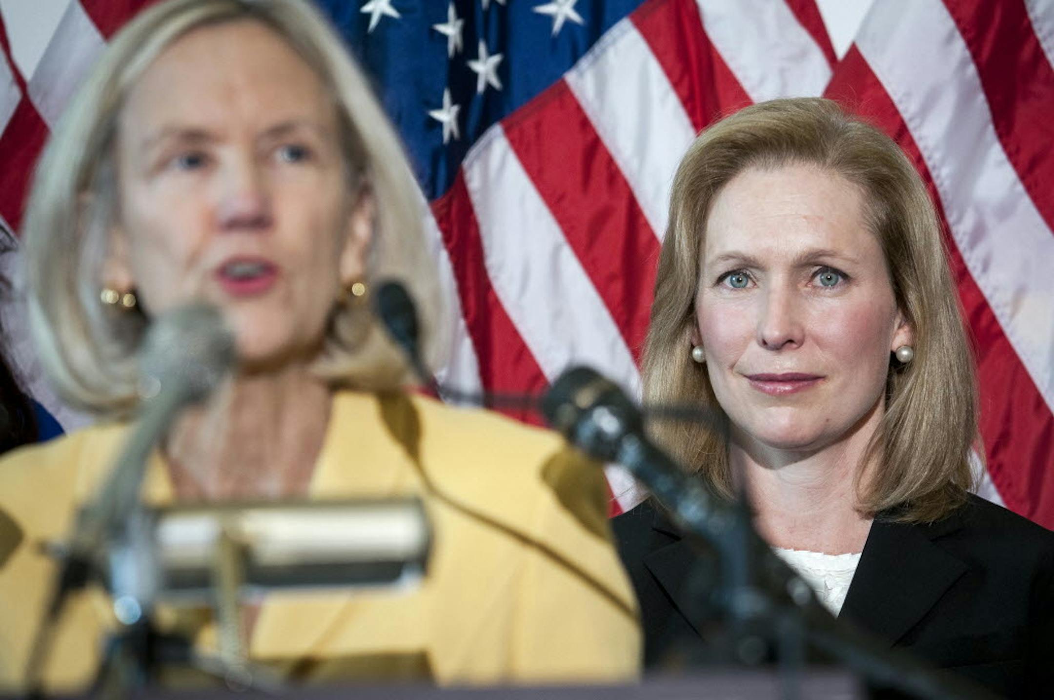 The new defense legislation does not include a contentious proposal from Sen. Kirsten Gillibrand, D-N.Y., right, to give victims of rape and sexual assault in the military an independent route outside the chain of command for prosecuting attackers, taking the authority away from commanders.