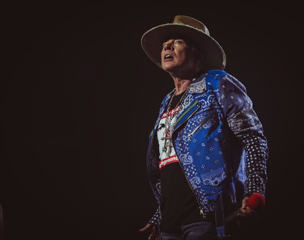 Axl Rose looked over the crowd at Xcel Energy Center on Tuesday during a three-hour Guns N’ Roses performance.