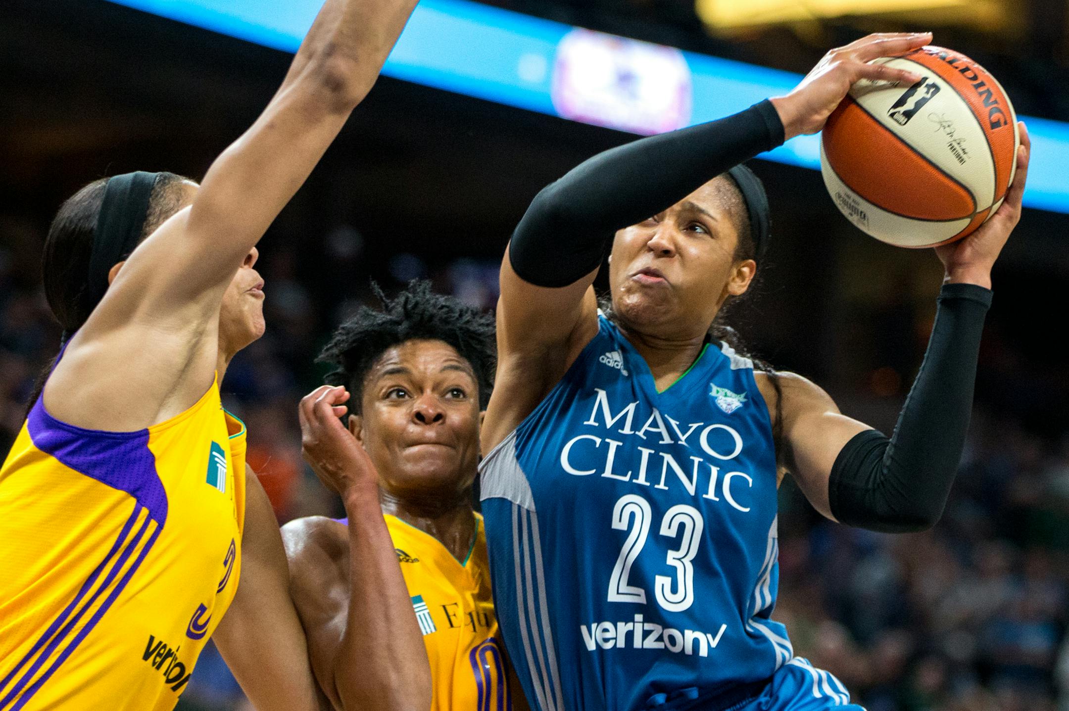 Minnesota Lynx forward Maya Moore (23) takes the ball past Los Angeles Sparks&#x2019; Alana Beard during the second half on Friday, Aug. 11, 2017, at Xcel Energy Center. ] COURTNEY PEDROZA &#x2022; courtney.pedroza@startribune.com; Friday, Aug. 11, 2017; Minnesota Lynx vs. Los Angeles Sparks; Xcel Energy Center; St. Paul, MN