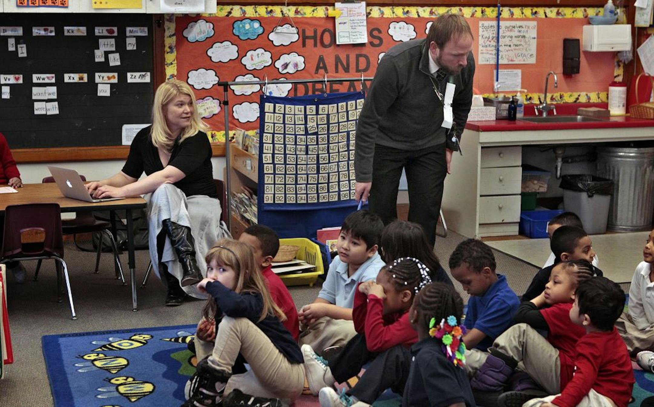 Teacher evaluator Sarah Johnson spent part of her morning observing Matt Shimon as he taught his kindergarten class at Obama Elementary School in St. Paul. Johnson spent about an hour in Shimon's classroom.