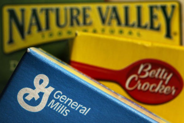 FILE - In this Sept. 20, 2011 file photo, General Mills products are displayed including Fiber One cereal, Betty Crocker Fruit Gushers snack, and Natu