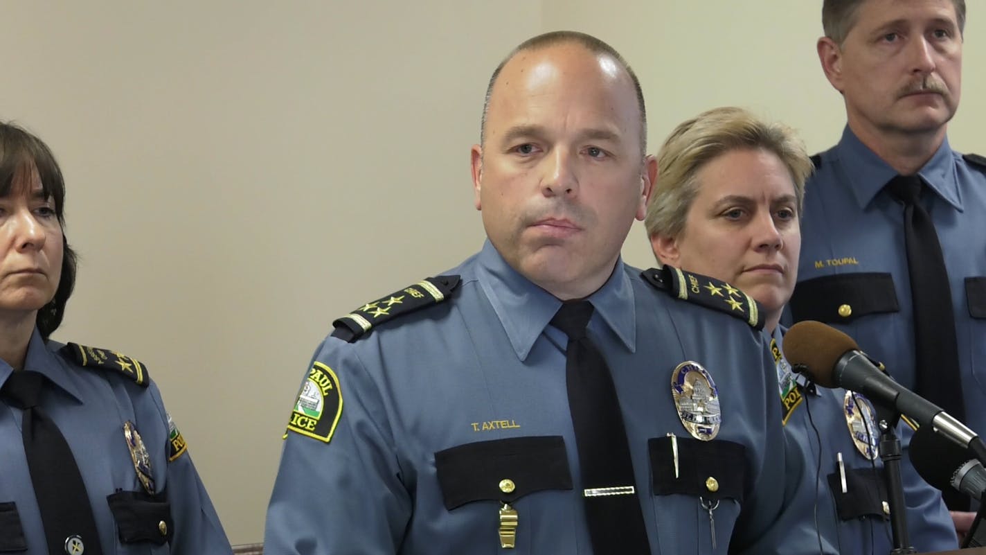 St. Paul Police Chief Todd Axtell, center, held a news conference on Friday, November 4, 2016 to share dashcam video of two police officers disciplined for a June, 2016 incident which included an officer kicking a man while being bitten by a police canine officer. ] SHARI L. GROSS / sgross@startribune.com St. Paul Police Headquarters, St. Paul, Minnesota, Friday, November 4, 2016