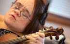 Gaelynn Lea gives a fiddle lesson at her studio in Duluth. March 4, 2016 in Duluth. A day in the life of Duluth fiddler/singer Gaelynn Lea, the winner
